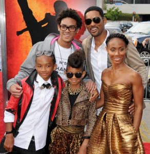 Will Smith with his family at an event