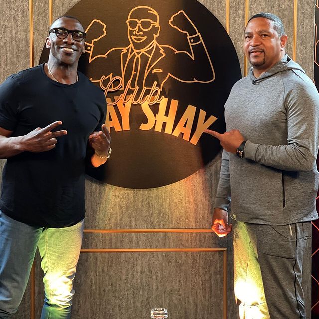 Shannon Sharpe with his friend